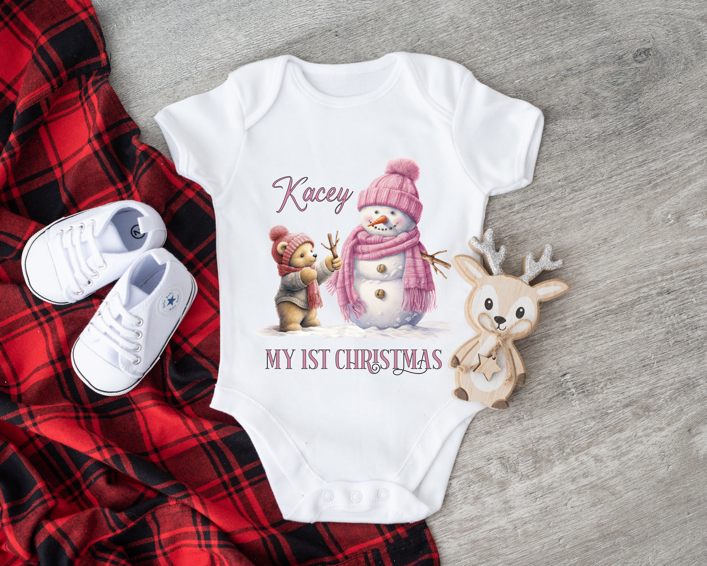 Personalised pink teddy bear building a snowman baby vest image 0
