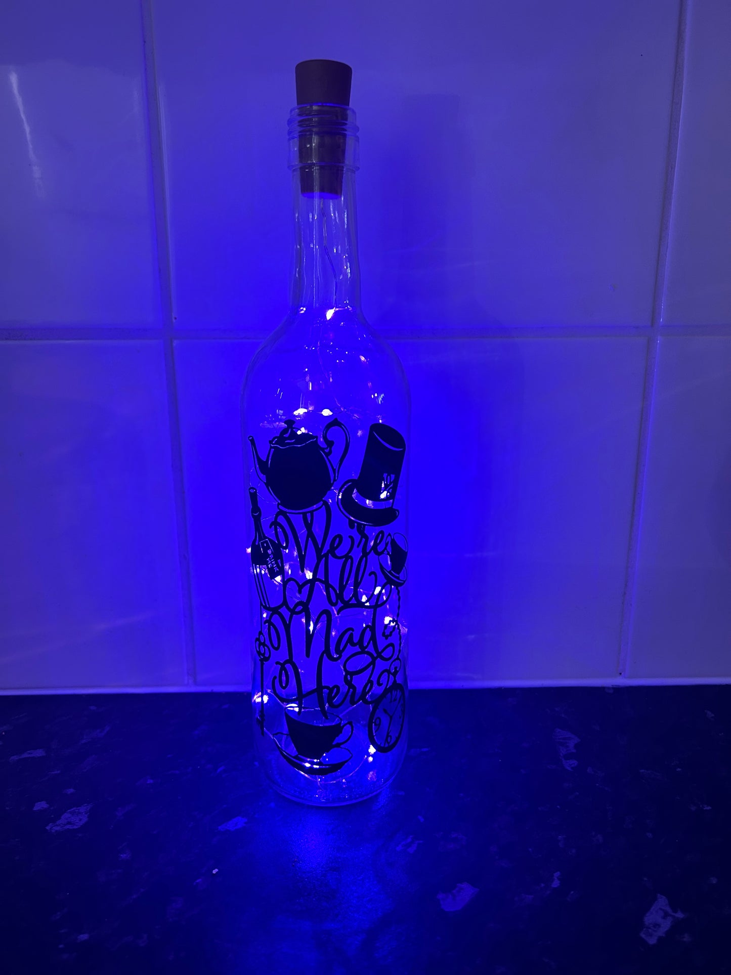 We're all mad here LED bottle image 2