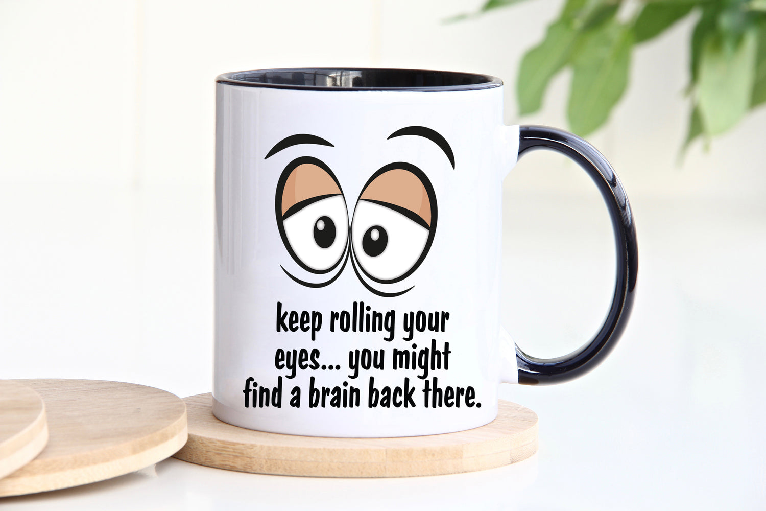 Keep rolling your eyes.... you might find a brain back there novelty black mug image 0