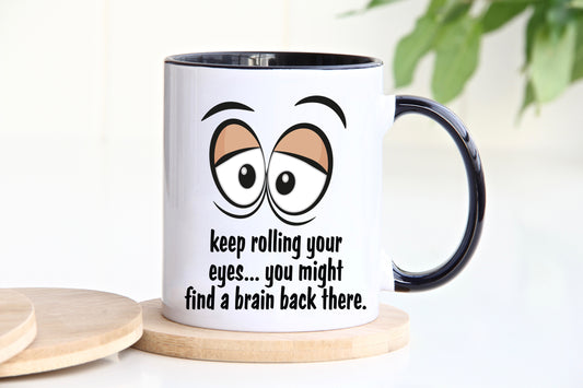 Keep rolling your eyes.... you might find a brain back there novelty black mug image 0