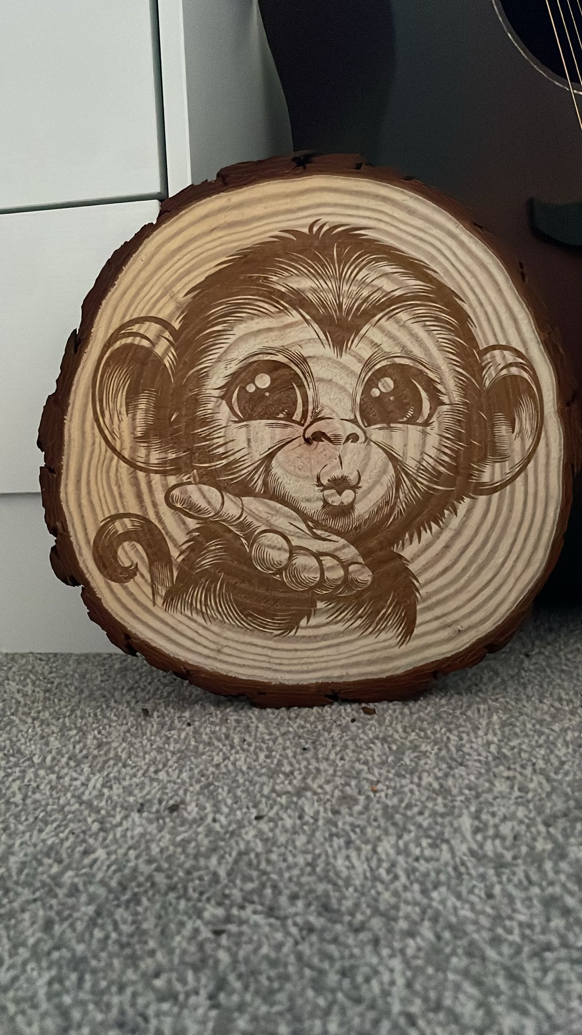 monkey blowing a kiss wooden slice art
